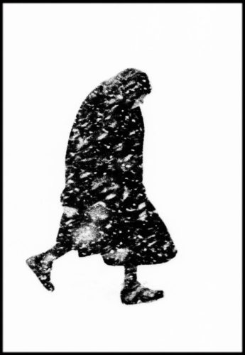 GERMANY. Hamburg. 1954. Old woman in a snowstorm.