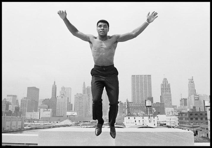 USA. Chicago. 1966. MUHAMMAD ALI, (formerly Cassius Clay), boxing world heavy weight champion in Chicago, jumping from a bridge over the Chicago River.